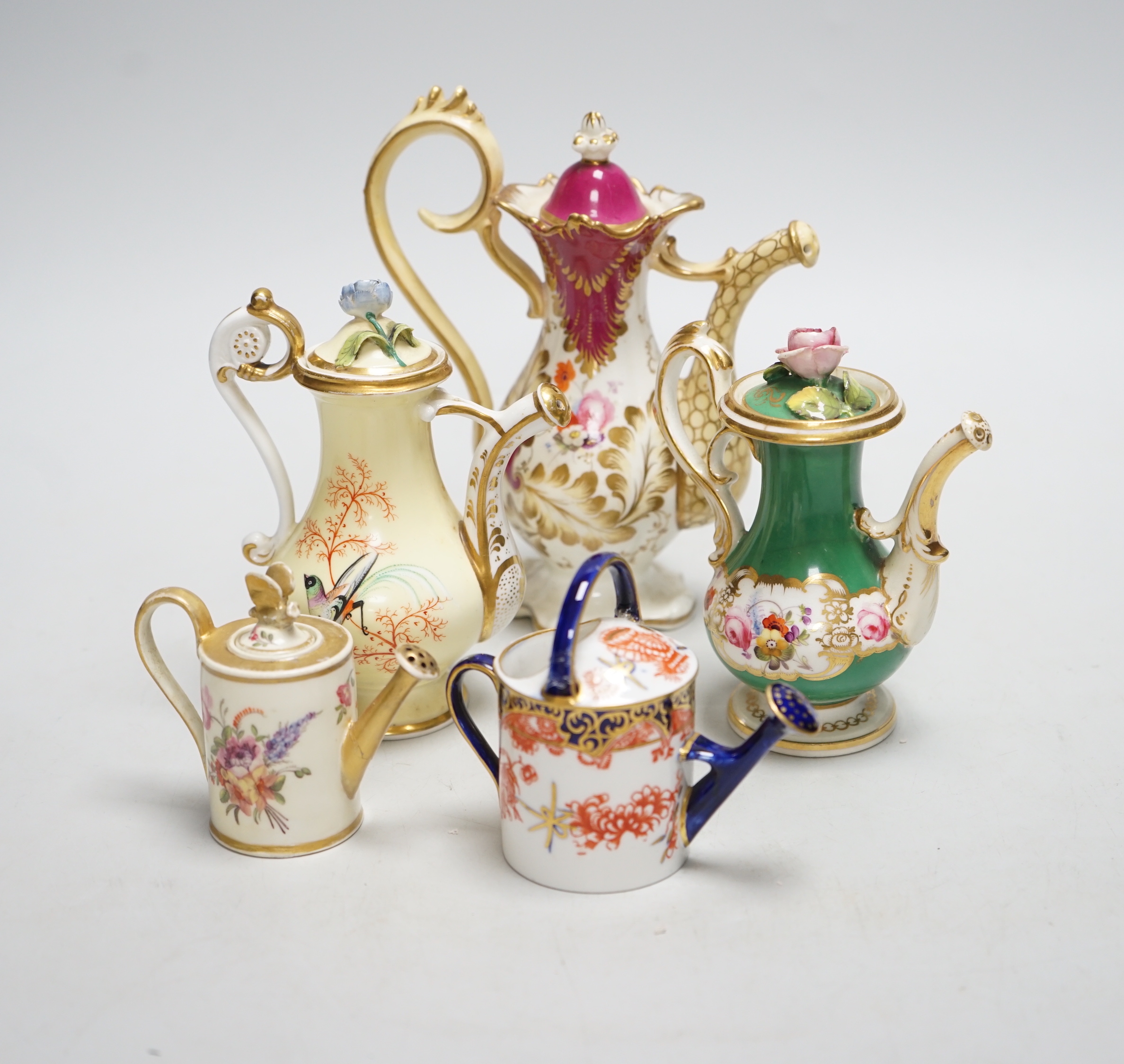 Five 19th/20th century rose water sprinklers by Royal Crown Derby, Davenport, etc. tallest 16cm